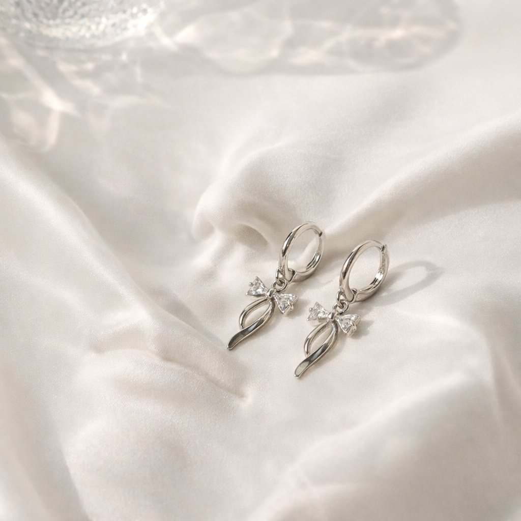 Sparkle bow hoop earrings